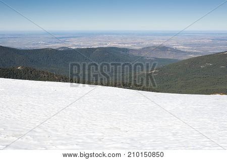 Views of Guadarrama Mountains and Segovia's plain from Navacerrada Ski Resort Navacerrada Mountain Pass Madrid Spain on January 4 2015