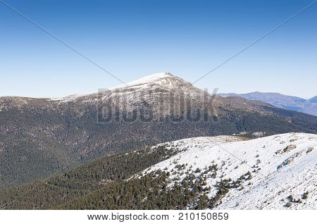 Views of Guadarrama Mountains from Navacerrada Ski Resort Navacerrada Mountain Pass Madrid Spain on January 4 2015.