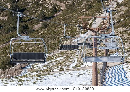 NAVACERRADA - JANUARY 4 2015: Chair lift in Navacerrada Ski Resort Navacerrada Mountain Pass Madrid Spain on January 4 2015.