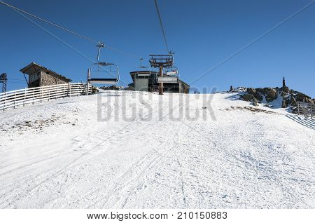 Chair lift in Navacerrada Ski Resort Navacerrada Mountain Pass Madrid Spain on January 4 2015.
