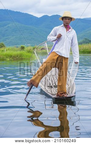 INLE LAKE MYANMAR - SEP 07 : Burmese fisherman at Inle lake Myanmar on September 07 2017 inle Lake is a freshwater lake located in Shan state