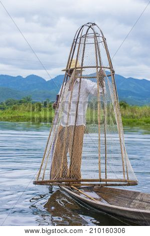INLE LAKE MYANMAR - SEP 07 : Burmese fisherman at Inle lake Myanmar on September 07 2017 inle Lake is a freshwater lake located in Shan state