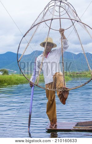 INLE LAKE MYANMAR - SEP 07 : Burmese fisherman at Inle lake Myanmar on September 07 2017 inle Lake is a freshwater lake located in Shan state