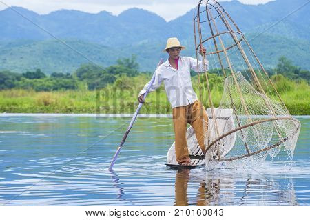 INLE LAKE MYANMAR - SEP 07 : Burmese fisherman at Inle lake Myanmar on September 07 2017 inle Lake is a freshwater lake located in Shan state