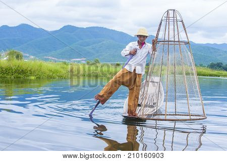 INLE LAKE MYANMAR - SEP 07 : Burmese fisherman at Inle lake Myanmar on September 07 2017 inle Lake is a freshwater lake located in Shan state