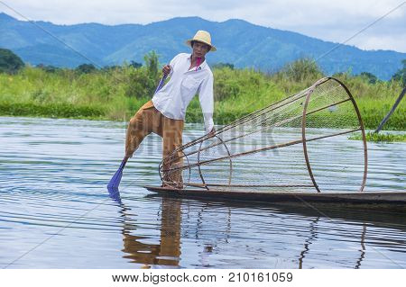 INLE LAKE MYANMAR - SEP 07 : Burmese fisherman at Inle lake Myanmar on September 07 2017 inle Lake is a freshwater lake located in Shan state