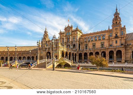 SEVILLA,SPAIN - OCTOBER 1,2017 - View at the pavilion buildings within the Plaza de Espana in Sevilla. Sevilla is situated on the plain of the river Guadalquivir.