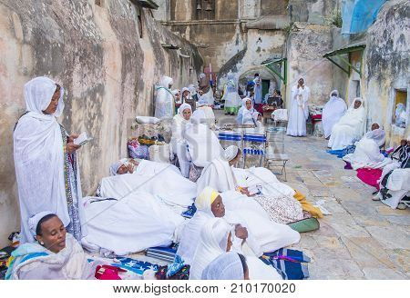 JERUSALEM - APRIL 15 : Ethiopian Orthodox worshipers waiting for the Holy fire ceremony to begin at the Ethiopian section of the Holy Sepulcher in Jerusalm Israel on April 15 2017