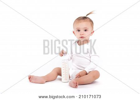 Cute Beauty Little Girl In White Pijamas With Milk