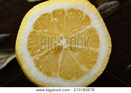 A cup of lemona cup of lemon on a wooden table