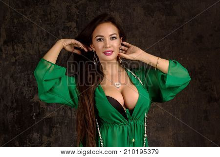 Beautiful Woman In Green Abaya.