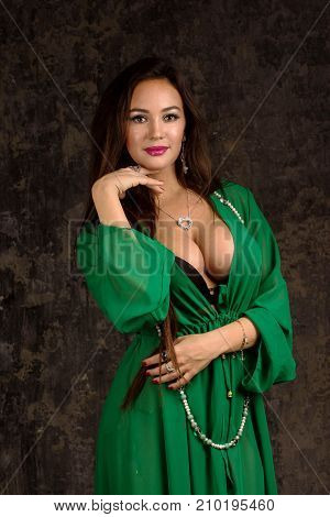 Beautiful Woman In Green Abaya.