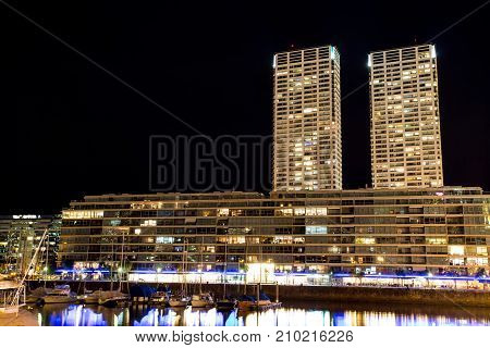 View of Puerto Madero dock in Buenos Aires, Argentina at night.