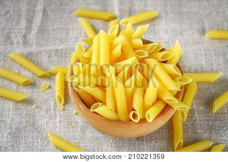 Penne Rigate. Macaroni In The Form Of Feathers. Mostaccioli Pasta