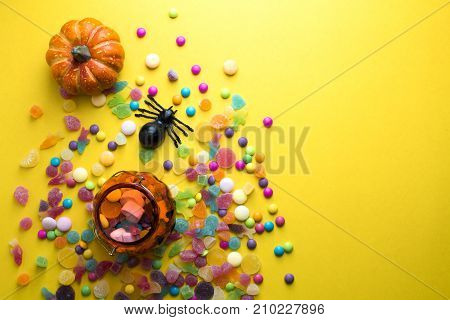 halloween candy colorful with decoration object on yellow ground