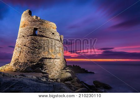 Floodlit Genoese Tower At Erbalunga In Corsica At Sunrise