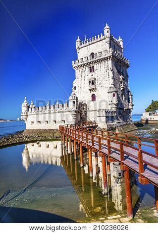 Belem Tower Torre de Belem Portuguese Symbol of Exploration Rflection Lisbon Portugal. Belem Tower was constructed in early 1500s on Tagus River and last point Portguese explorers saw when left Lisbon.