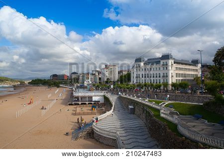 Santander Spain - July 1 2017: El Sardinero waterfront promenade and surfer beach. El Sardinero is a popular beach located in the Spanish city of Santander Cantabria