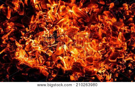 background of burning coals . Photo of an abstract texture