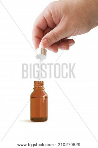 Dropper Bottle. Brown conteiner isolated on white background. With clipping path