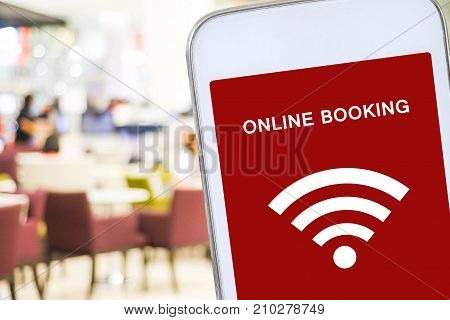 Online booking over blur restaurant background food and drink restauant reservation