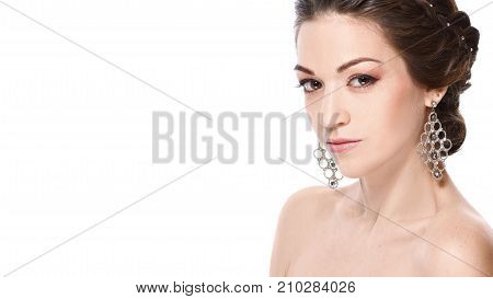 Fashion Portrait Of Young Beautiful Woman With Jewelry. Brunette Girl. Perfect Make-up.  Isolated On