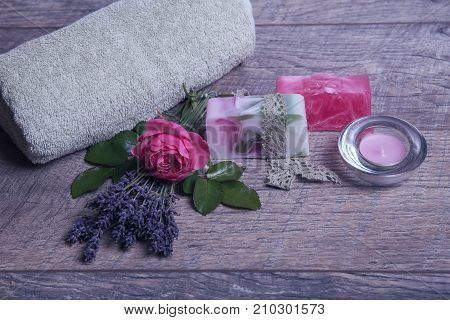 Handmade Soap with bath and spa accessories. Dried lavender and nostalgic pink rose. Spa background