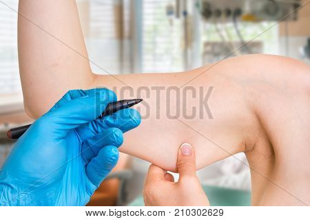 Woman Is Testing Her Muscle Under Her Arm