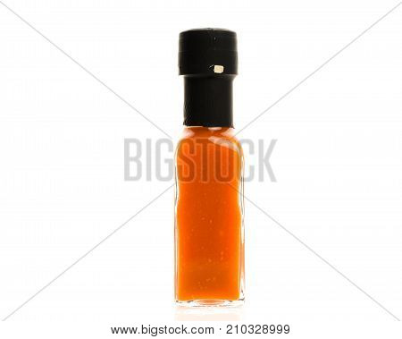 Hot Chili Sauce Glass Bottle On White Background.