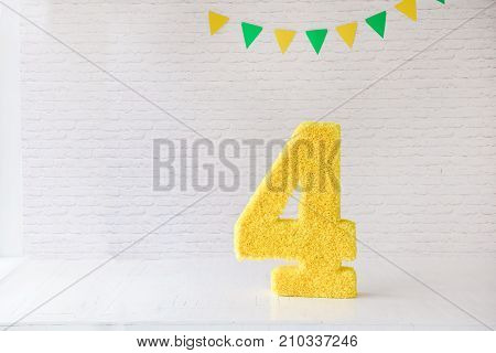 decor for the holiday birthday. 4 years. flags and a large figure. for smash the cake