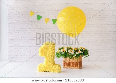 decor for the holiday birthday. one years. balloon and a large figure. for smash the cake