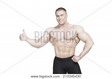 Close-up of a Bodybuilder with a Thumb Up on white on White Background