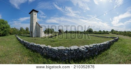 Coastal Swedish Chapel blue sky and seaside natural environment background. Shore in Osmussaar Island Nature Reserve in Estonia National Park in Europe