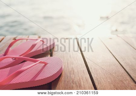 A Pair Of Flip Flops On The Pier