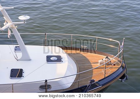 A bow of a luxury yacht on the river