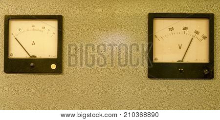 Analog ampere meter or amp meter and analog voltmeter.