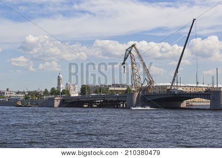 View of the renovated Tuchkov Bridge from the Makarova Embankment in St. Petersburg, Russia