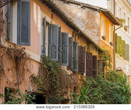 windows in an ancient roman alley in rome