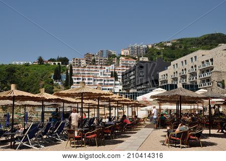 Budva, Montenegro - May 25, 2014: town beach with views of modern buildings