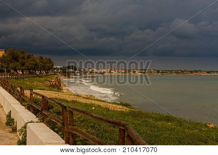 Rain clouds on the Ionian Sea at the southeast coast of Sicily Avola Italy