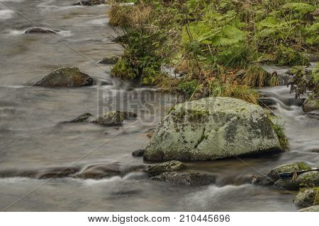 Upa River In Velka Upa Village In Krkonose Mountains With Color Autumn