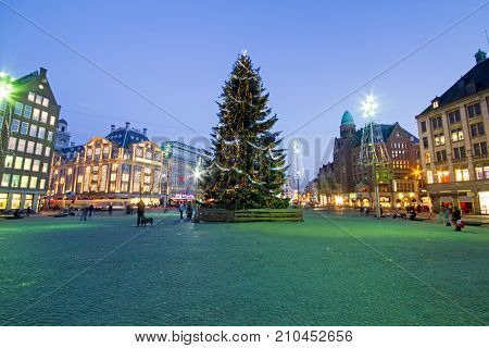 Christmas on the Damsquare in Amsterdam in the Netherlands at night