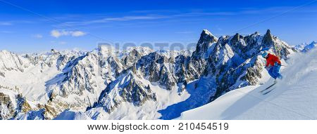 Skiing Vallee Blanche Chamonix with amazing panorama of Grandes Jorasses and Dent du Geant from Aiguille du Midi, Mont Blanc mountain, Haute-Savoie, France
