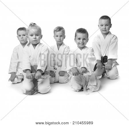 Little children in kimonos on white background
