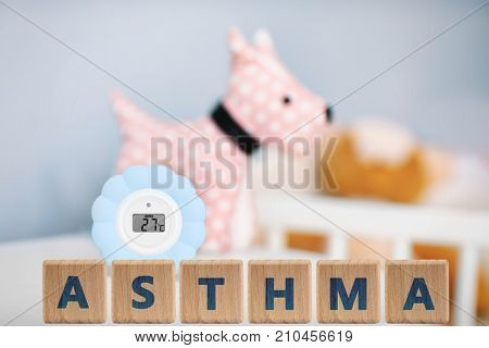 Digital device for temperature and humidity control in baby room. Asthma concept