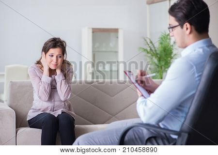 Pregnant woman visiting psychologist doctor