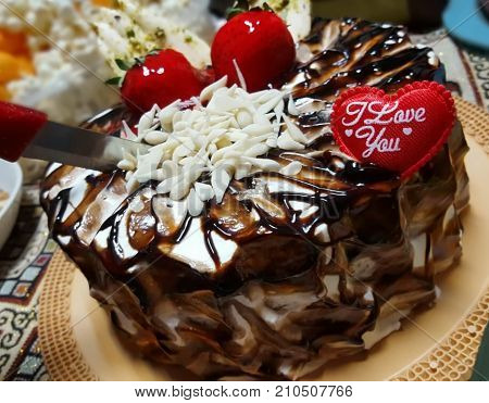 i love you so happy birthday. beautiful and delicious chocolate cake.