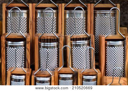 Graters stainless steel with a wooden package