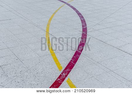 Colorful lines of a soccer and basketball field.