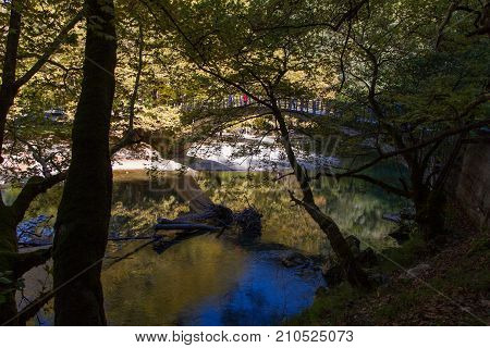 Scenic Voidomatis River And Papigo Bridge In Epirus, Greece